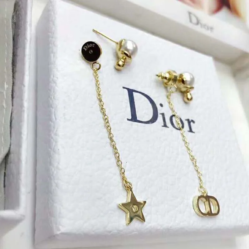 Dior La Petite Tribale Earrings in Gold for Women in Tone Metal Dior La Petite Tribale Earrings in Gold for Women in Tone Metal
