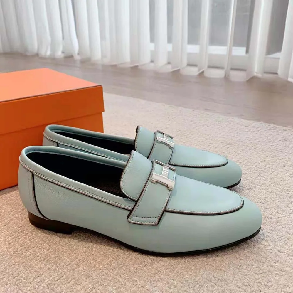 Hermes Paris Loafer in Calfskin with Palladium Plated Signature “H” Detail for Women in Blue Hermes Paris Loafer in Calfskin with Palladium Plated Signature “H” Detail for Women in Blue