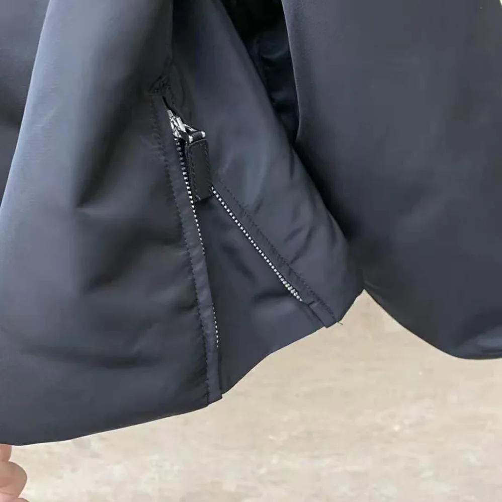 Prada Re-Nylon Blouson Jacket with Enameled Metal Triangle Logo for Women in Black Prada Re-Nylon Blouson Jacket with Enameled Metal Triangle Logo for Women in Black