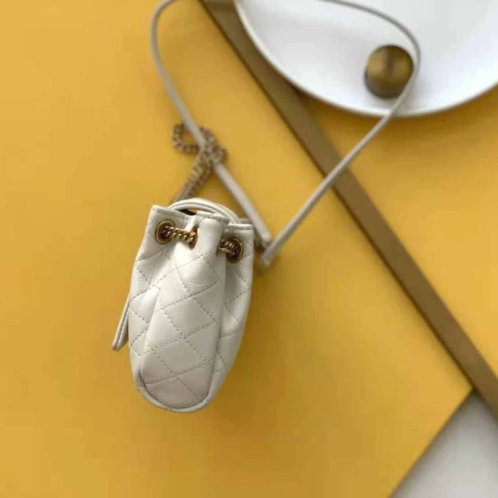 Saint Laurent YSL Mini Nolita in Lambskin for Women in White Saint Laurent YSL Mini Nolita in Lambskin for Women in White