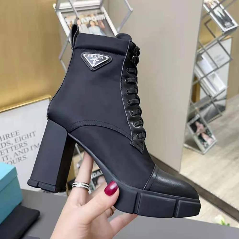 Prada Brushed Leather and Nylon Booties for Women in Black Prada Brushed Leather and Nylon Booties for Women in Black