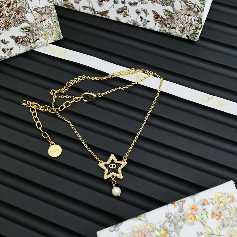 Dior Petit CD Lucky Baroque Necklace Gold-Finish Metal with White Resin Pearls and Deep Ocean Blue Glass for Women Dior Petit CD Lucky Baroque Necklace Gold-Finish Metal with White Resin Pearls and Deep Ocean Blue Glass for Women