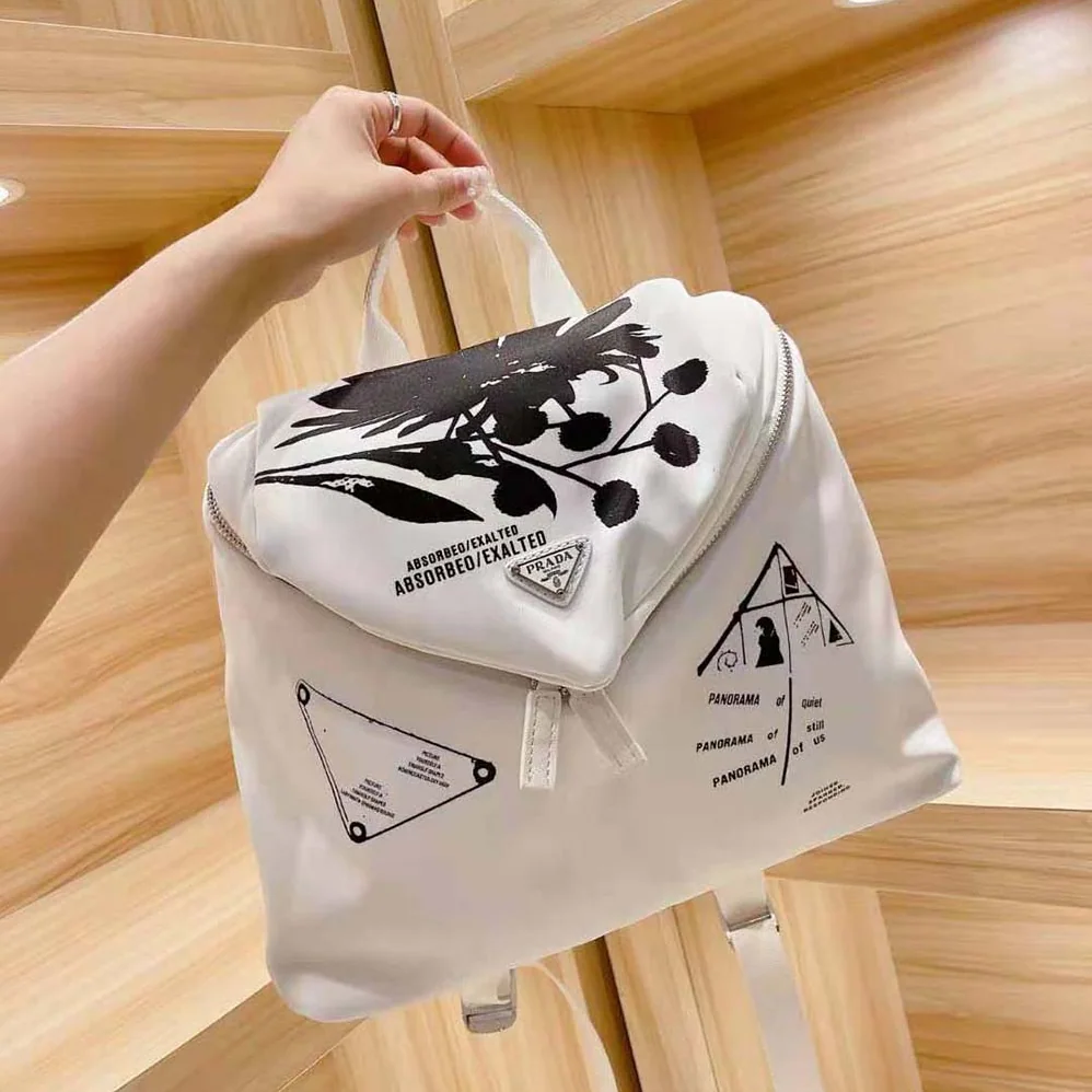 Prada Signaux Printed Nylon Backpack for Women in White Prada Signaux Printed Nylon Backpack for Women in White