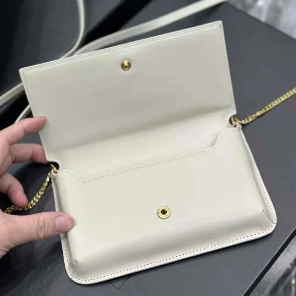 Saint Laurent YSL Cassandre Phone Holder with Strap in Smooth Leather for Women in White Saint Laurent YSL Cassandre Phone Holder with Strap in Smooth Leather for Women in White