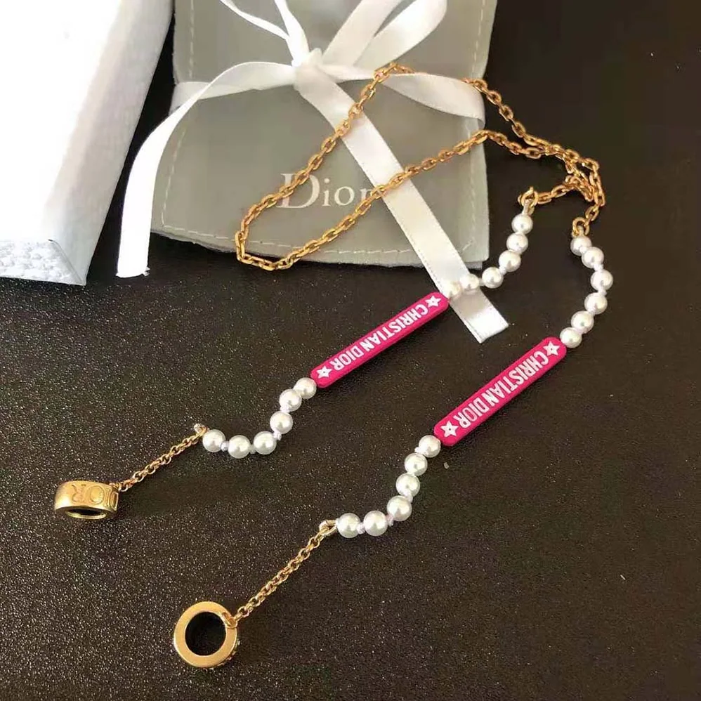 Dior D-Vibe Necklace for Headphones Gold-Finish Metal and White Resin Pearls for Women Dior D-Vibe Necklace for Headphones Gold-Finish Metal and White Resin Pearls for Women