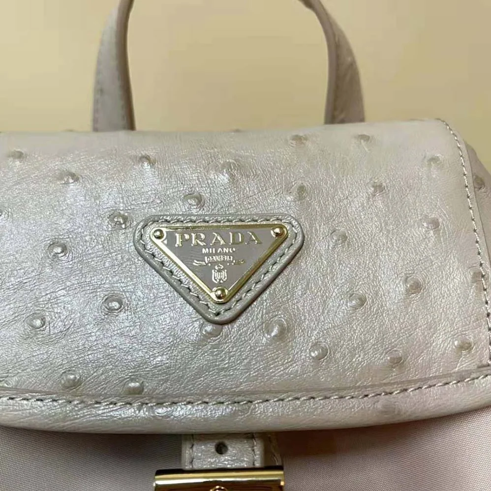 Prada Re-Nylon and Ostrich Leather Backpack for Women in Pink Prada Re-Nylon and Ostrich Leather Backpack for Women in Pink