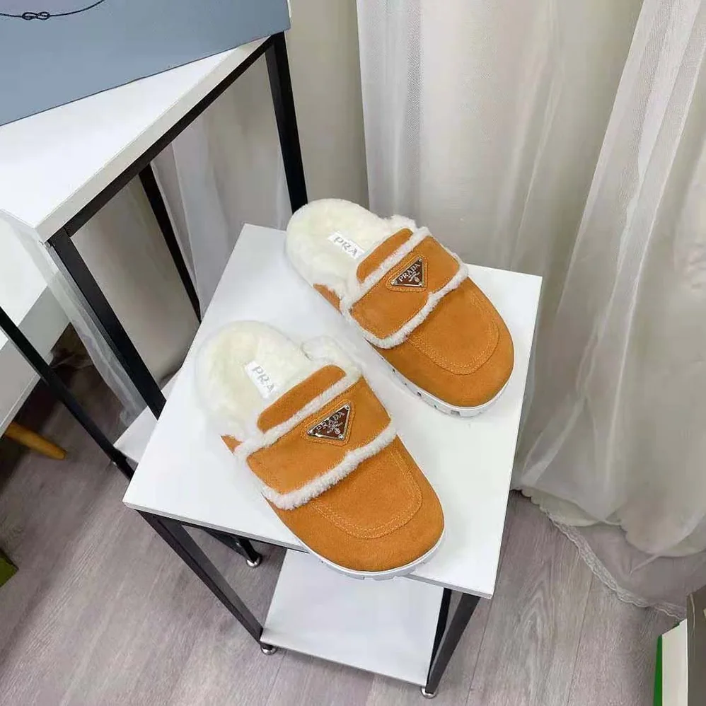 Prada Shearling Slippers Enameled Metal Triangle Logo for Women in Yellow Prada Shearling Slippers Enameled Metal Triangle Logo for Women in Yellow