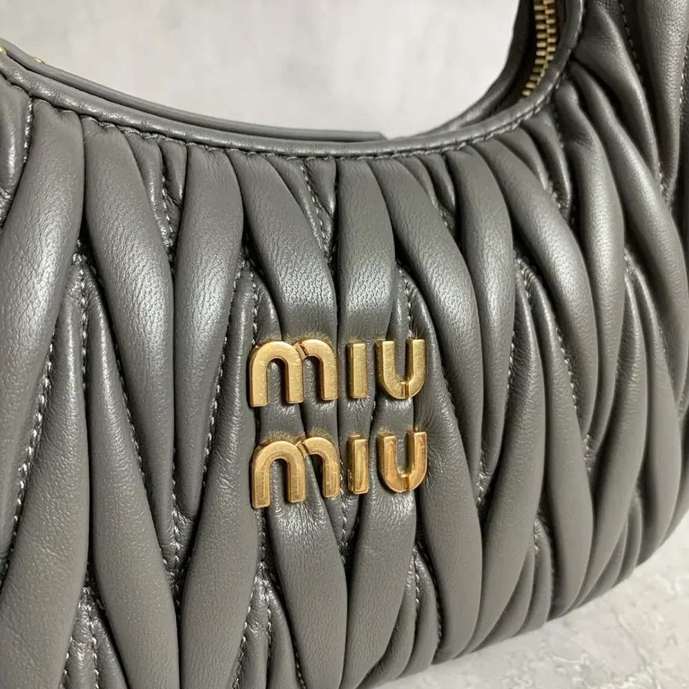 Miu Miu Wander matelassé nappa leather bag for Women in Gray/White Miu Miu Wander matelassé nappa leather bag for Women in Gray/White