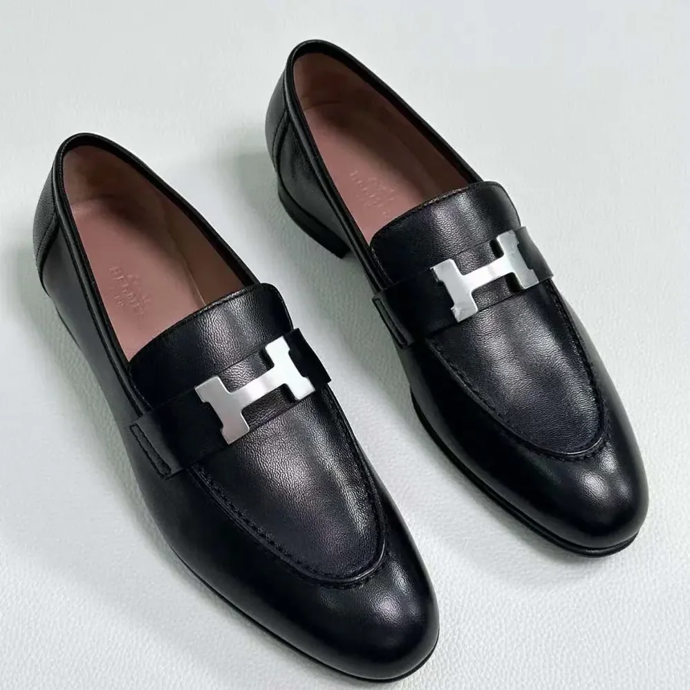 Hermes Loafer in Calfskin with Palladium Plated Signature “H” Detail for Men in Black Hermes Loafer in Calfskin with Palladium Plated Signature “H” Detail for Men in Black