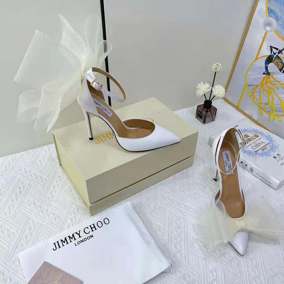 Jimmy Choo Averly 100 Latte Pumps with Asymmetric Grosgrain Mesh Fascinator Bows for Women Jimmy Choo Averly 100 Latte Pumps with Asymmetric Grosgrain Mesh Fascinator Bows for Women
