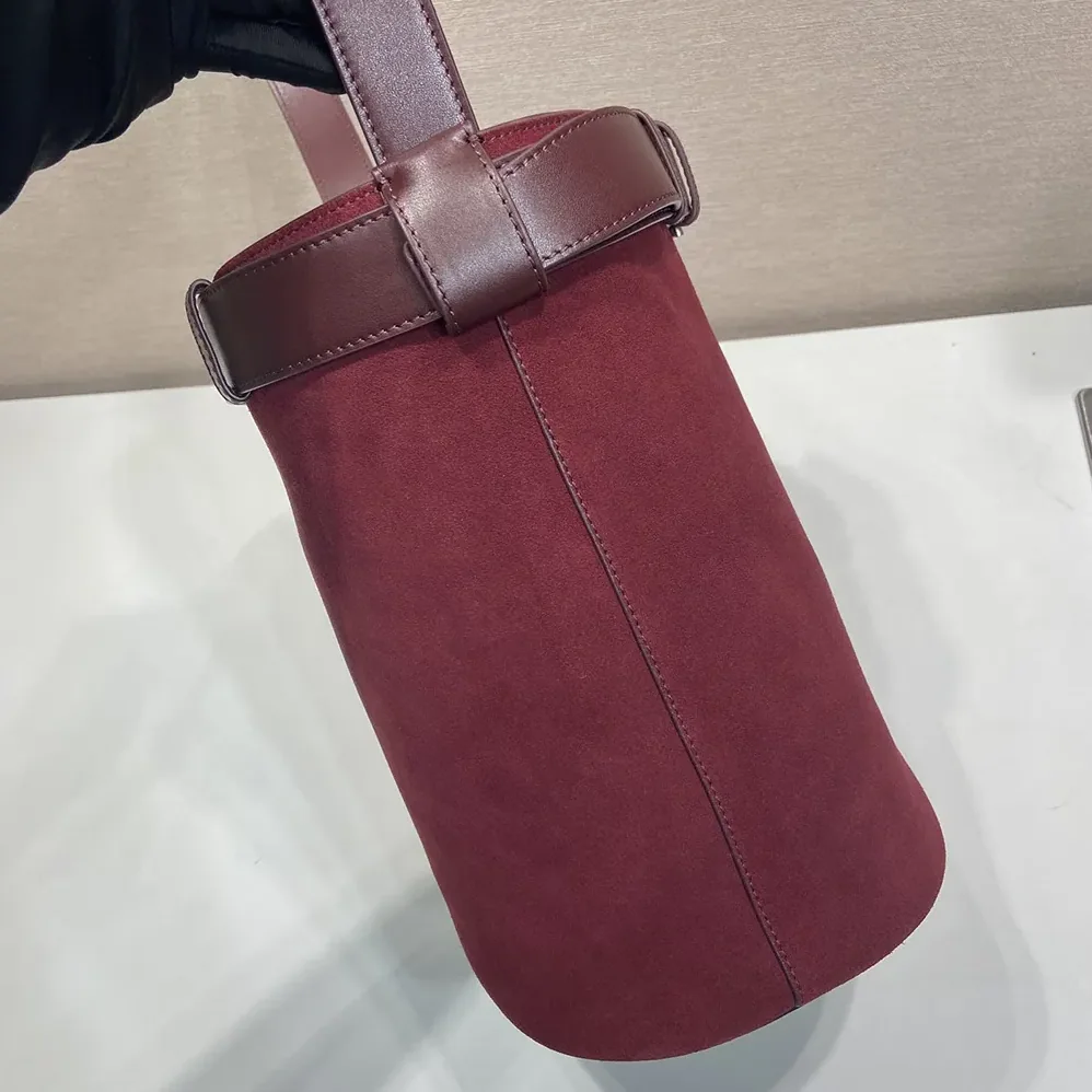Prada Buckle Belted Suede Bucket Bag for Women in Burgundy Prada Buckle Belted Suede Bucket Bag for Women in Burgundy