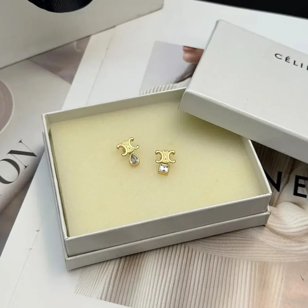 Celine Triomphe Twinkle Earrings in Strass and Brass with Gold Finish for Women