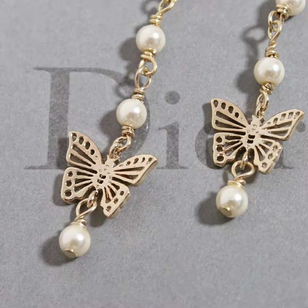 Dior Métamorphose Earrings Gold-Finish Metal and White Resin Pearls for Women Dior Métamorphose Earrings Gold-Finish Metal and White Resin Pearls for Women