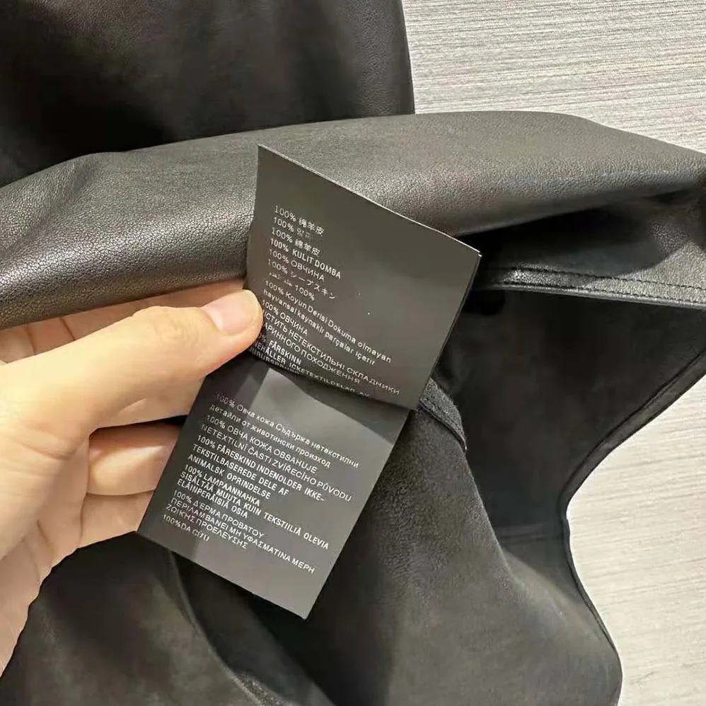 Prada Leather Dress with Knit Triangle Logo for Women in Black Prada Leather Dress with Knit Triangle Logo for Women in Black