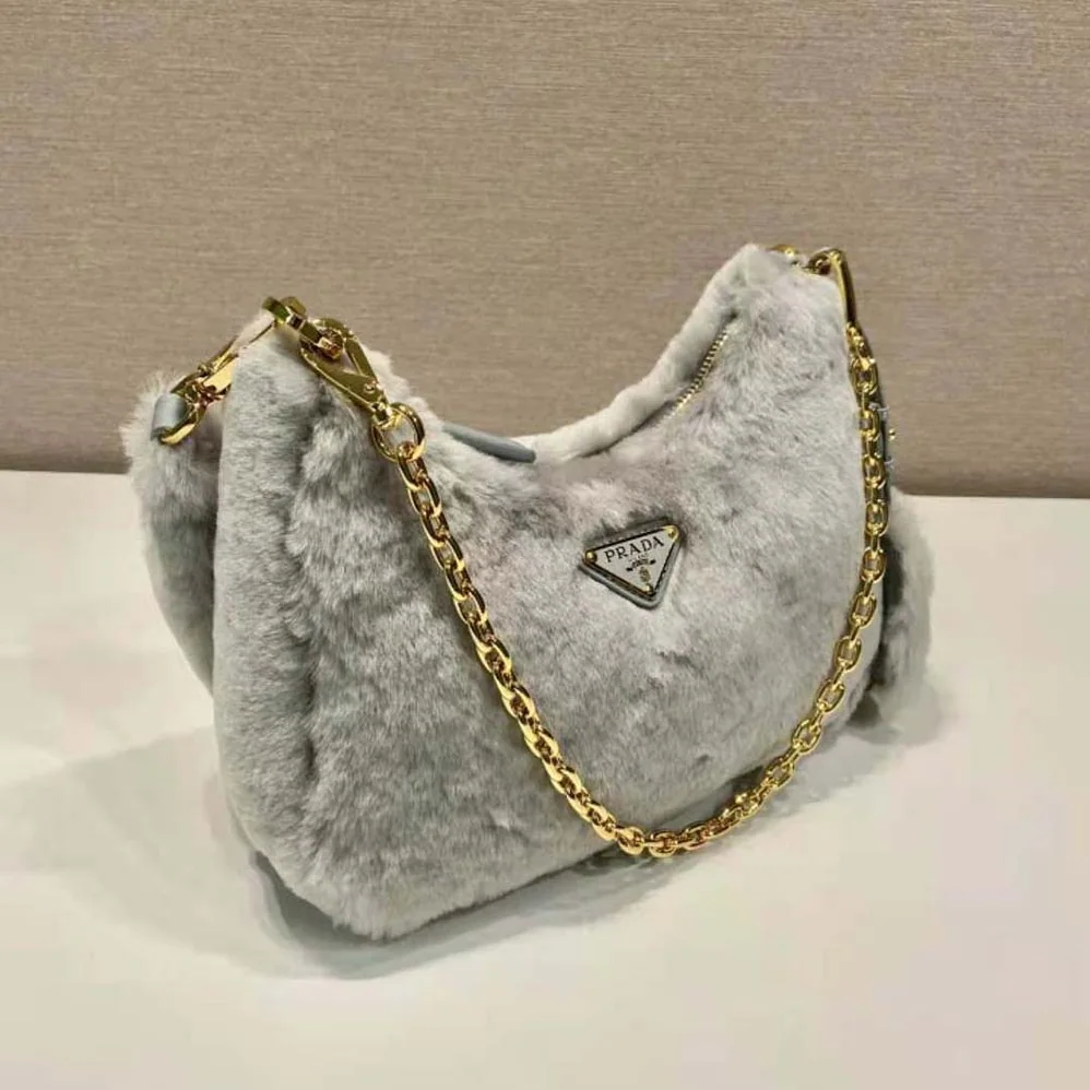 Prada Shearling Mini-Bag with the Enameled Metal Triangle Logo for Women in Silver