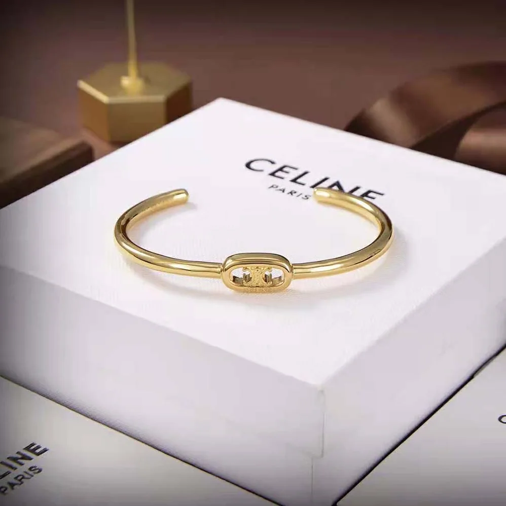 Celine Maillon Triomphe Thin Cuff in Brass with Gold Finish for Women