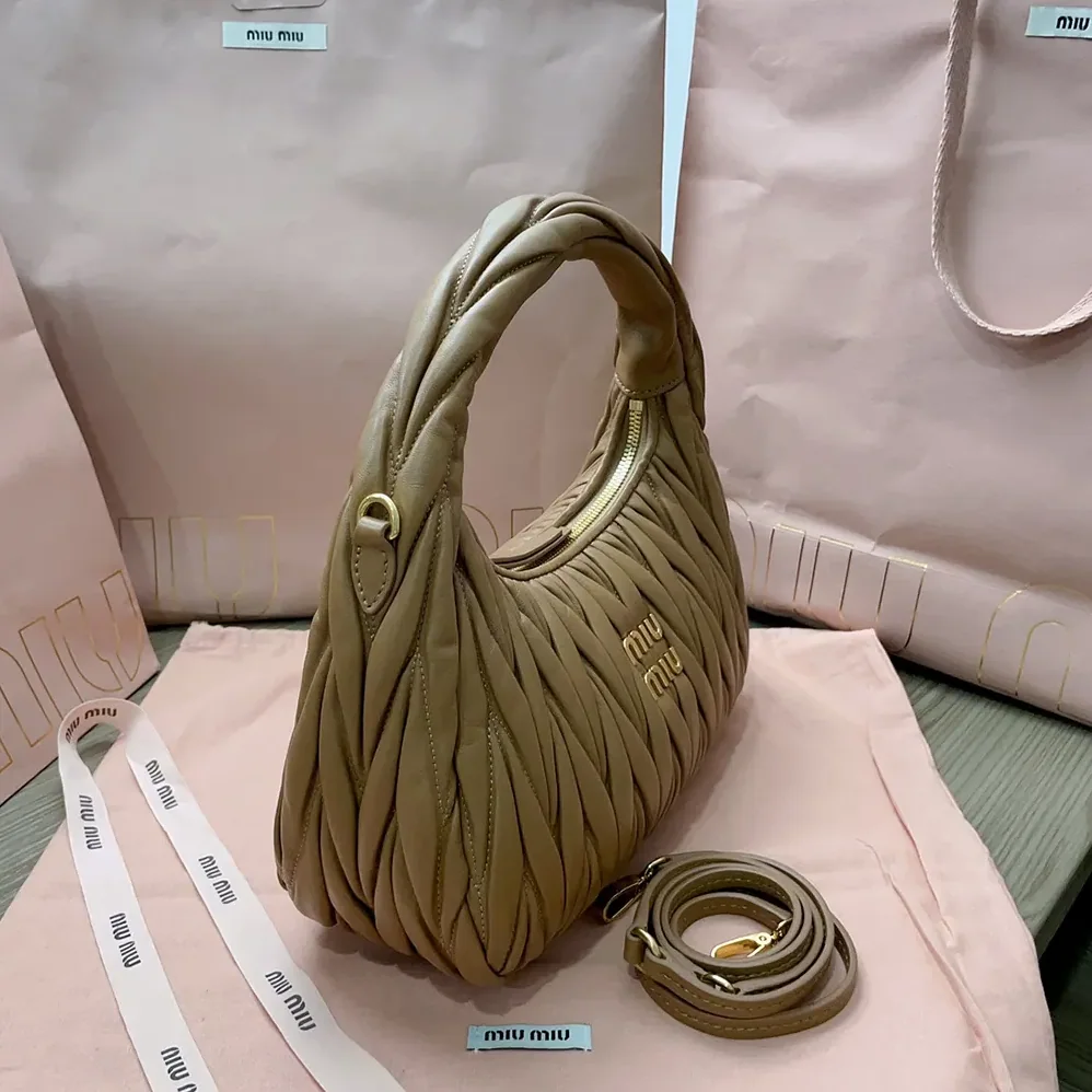 Miu Miu Wander Matelassé Nappa Leather Hobo Bag for Women in Caramel Miu Miu Wander Matelassé Nappa Leather Hobo Bag for Women in Caramel