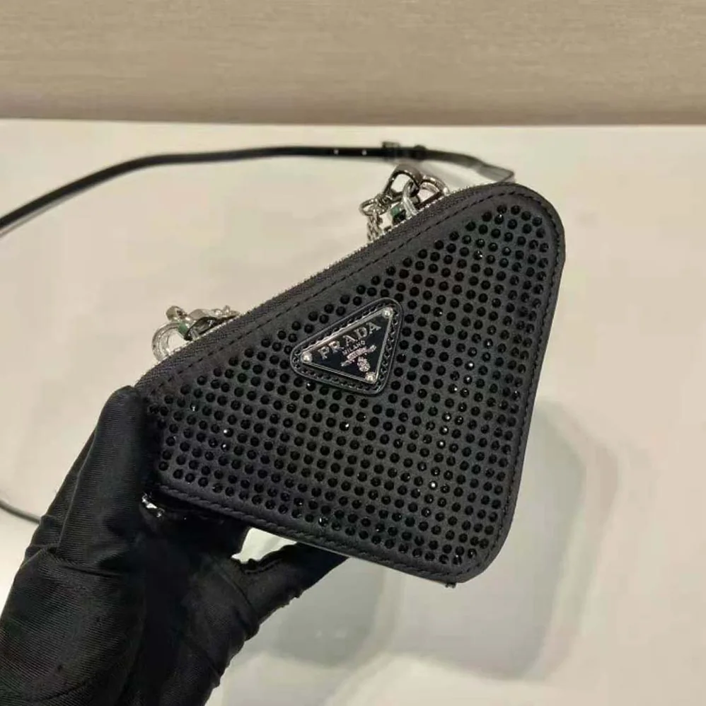 Prada Triangular Embellished Satin and Leather Mini-pouch for Women in Black Prada Triangular Embellished Satin and Leather Mini-pouch for Women in Black