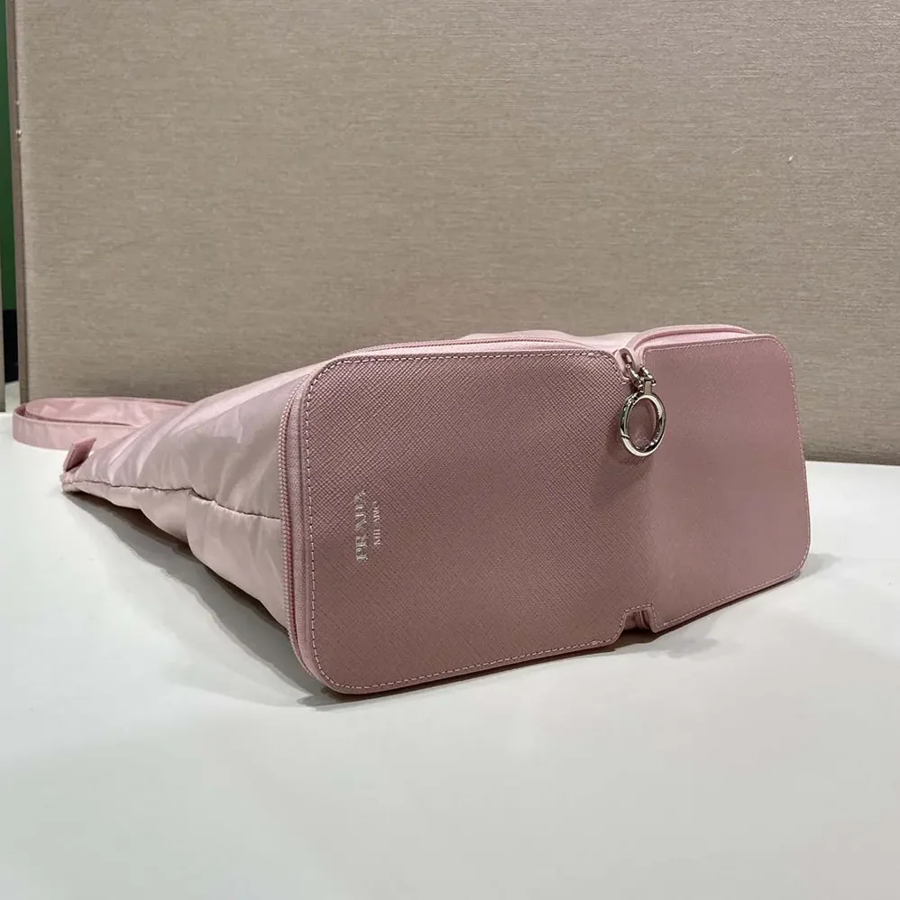 Prada Saffiano Leather Pendant With Re-Nylon Tote Bag for Women in Peach Prada Saffiano Leather Pendant With Re-Nylon Tote Bag for Women in Peach