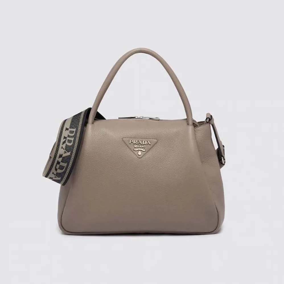 Prada Large Leather Handbag with the Prada Metal Lettering Logo Gleaming at Its Center for Women in Brown Prada Large Leather Handbag with the Prada Metal Lettering Logo Gleaming at Its Center for Women in Brown