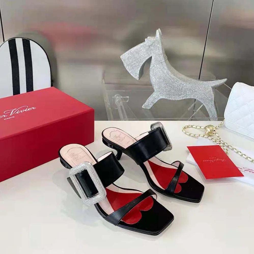 Roger Vivier Viv Choc Side Strass Buckle Mules in Leather for Women in Black Roger Vivier Viv Choc Side Strass Buckle Mules in Leather for Women in Black