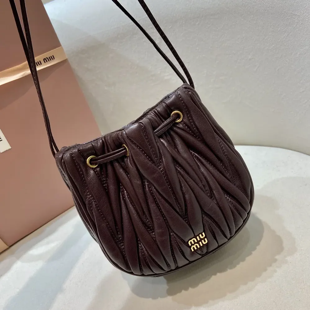 Miu Miu Matelassé Nappa Leather Pouch for Women in Burgundy Miu Miu Matelassé Nappa Leather Pouch for Women in Burgundy