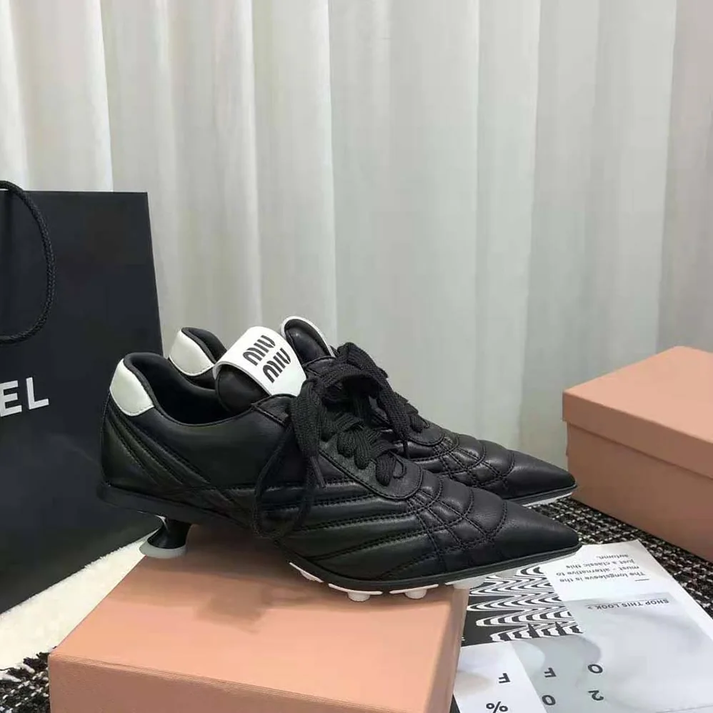 Miu Miu Nappa Leather Mid-heel Sneakers for Women in Black