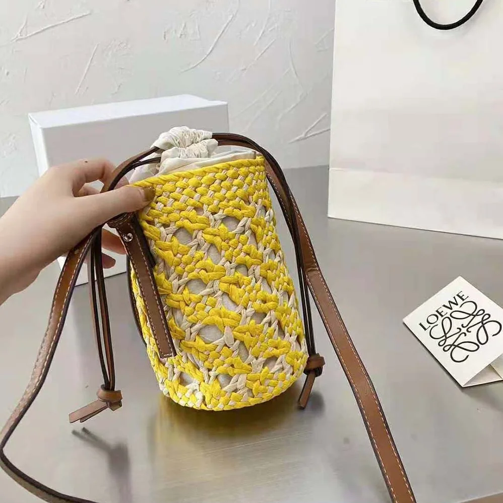 Loewe Cylinder Pocket in Iraca Palm and Calfskin for Women Loewe Cylinder Pocket in Iraca Palm and Calfskin for Women