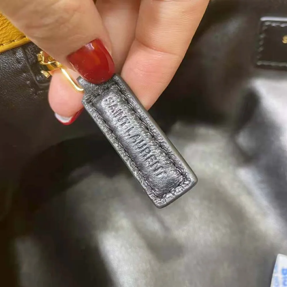 Saint Laurent YSL Sade Puffer Envelope Clutch in Lambskin for Women in Yellow Saint Laurent YSL Sade Puffer Envelope Clutch in Lambskin for Women in Yellow