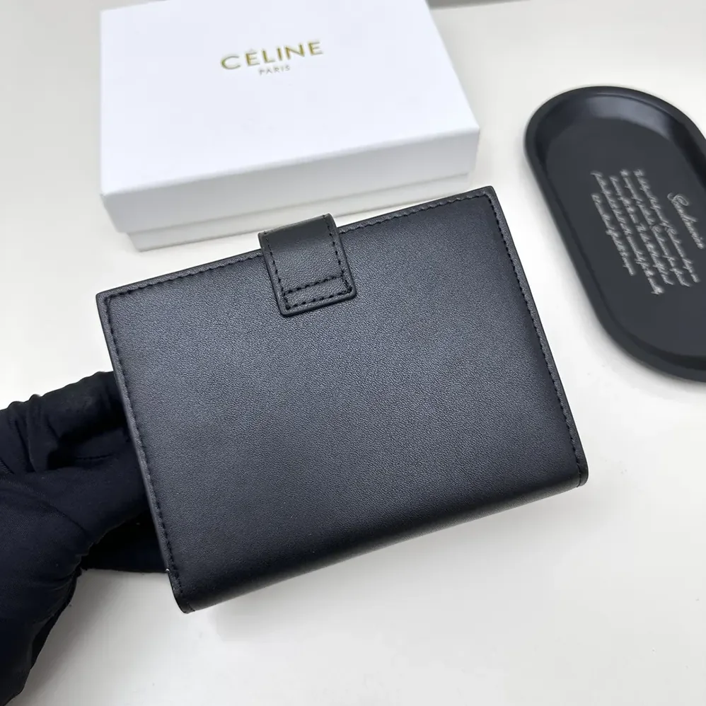 Celine Medium Strap Wallet Nino in Supple Grained Calfskin for Women in Black Celine Medium Strap Wallet Nino in Supple Grained Calfskin for Women in Black