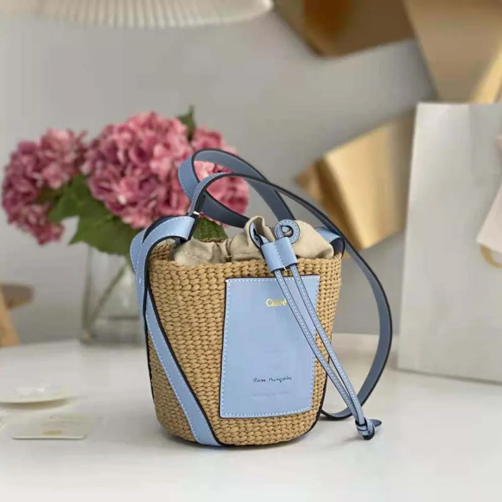 Chloe Small Basket in Fair-Trade Paper and Shiny Calfskin for Women in Blue Chloe Small Basket in Fair-Trade Paper and Shiny Calfskin for Women in Blue