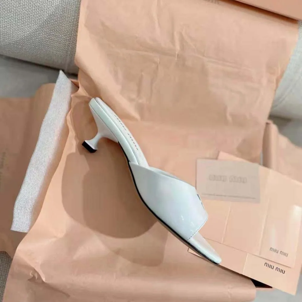 Miu Miu Patent Leather Sandals in 45 mm Heel Height for Women in White Miu Miu Patent Leather Sandals in 45 mm Heel Height for Women in White