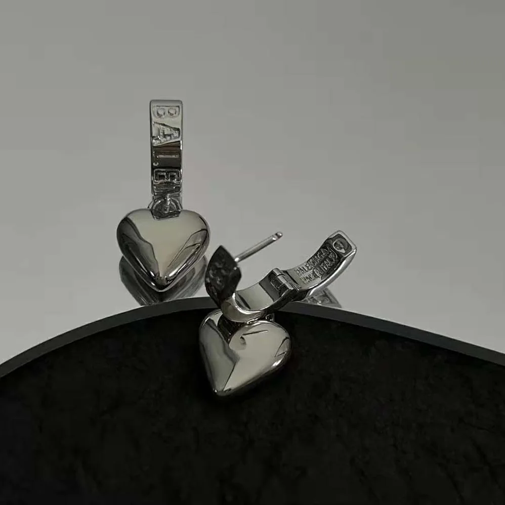 Balenciaga Sharp Heart Earrings in Silver for Women