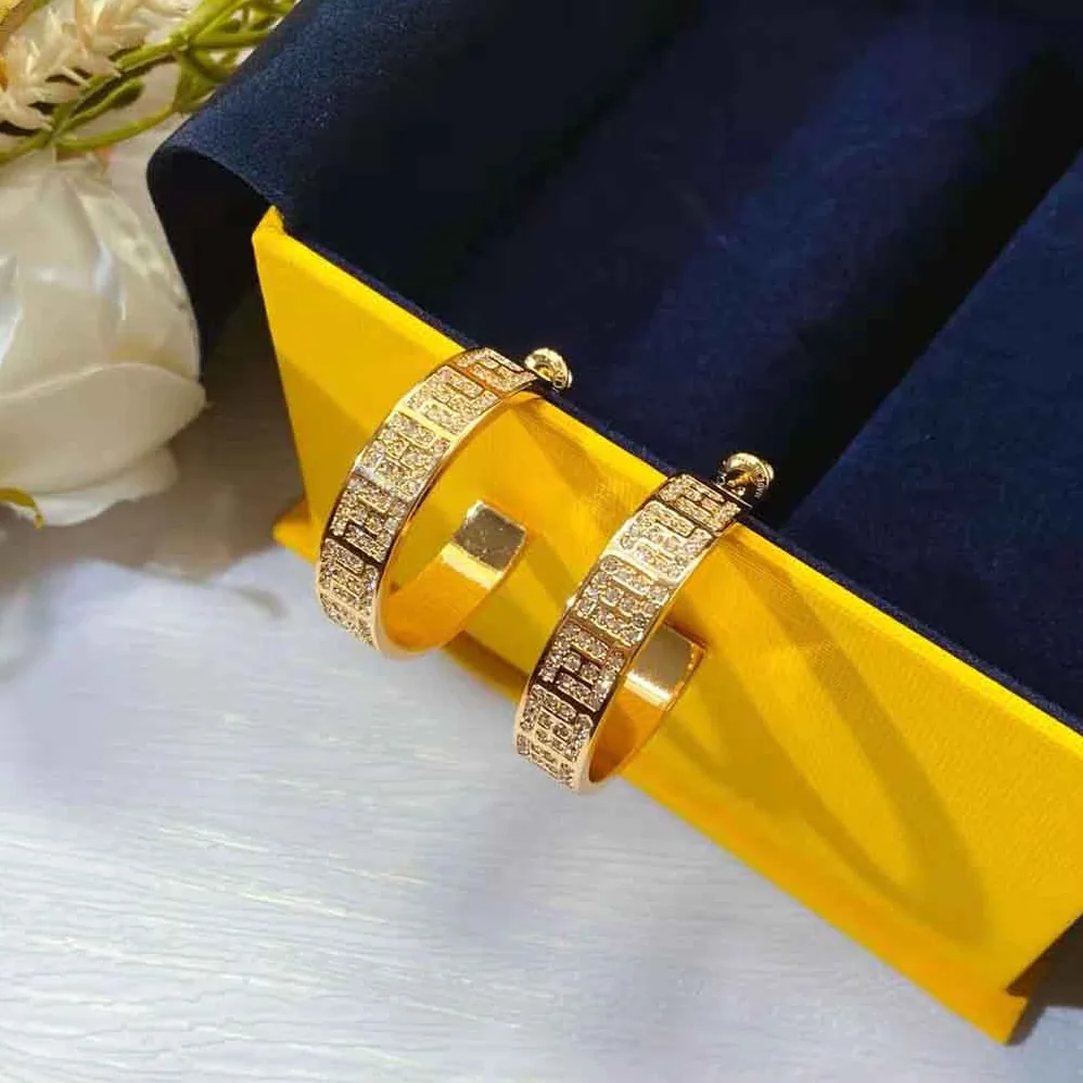Fendi Hoop Earrings with FF Motif Gold for Women in colored Fendi Hoop Earrings with FF Motif Gold for Women in colored