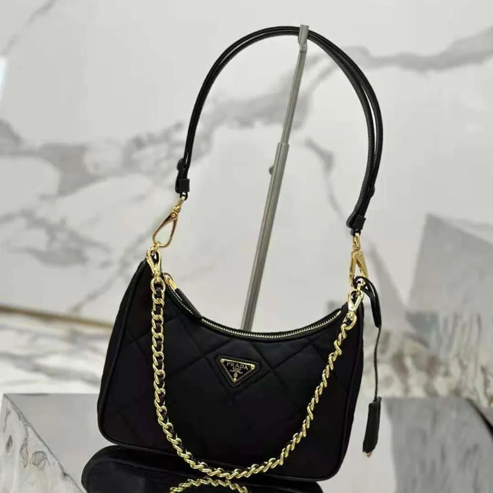 Prada Re-Edition 1995 Chaîne Re-Nylon Mini-bag for Women in Black Prada Re-Edition 1995 Chaîne Re-Nylon Mini-bag for Women in Black