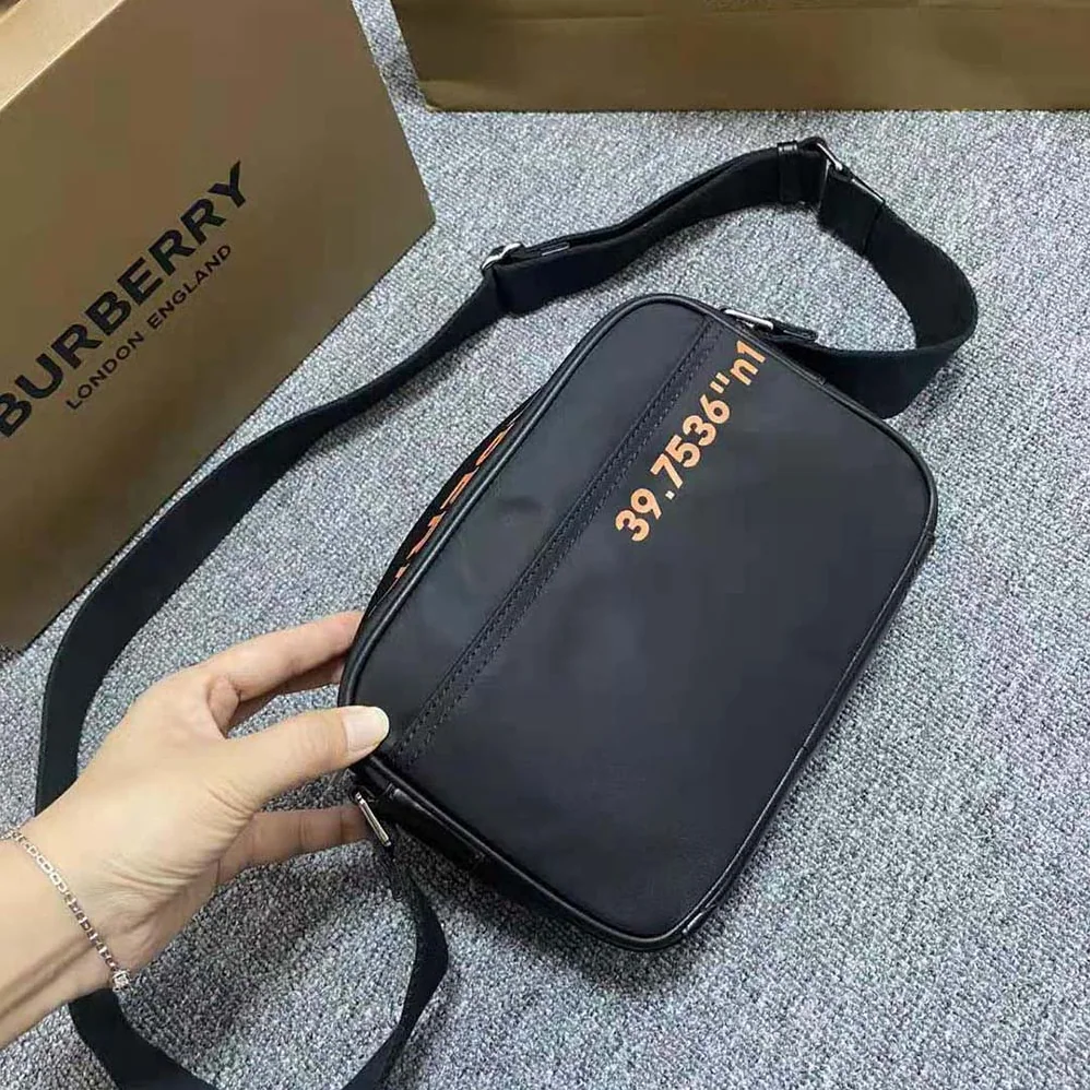 Burberry Coordinates Print Nylon Crossbody Bag for Men in Orange