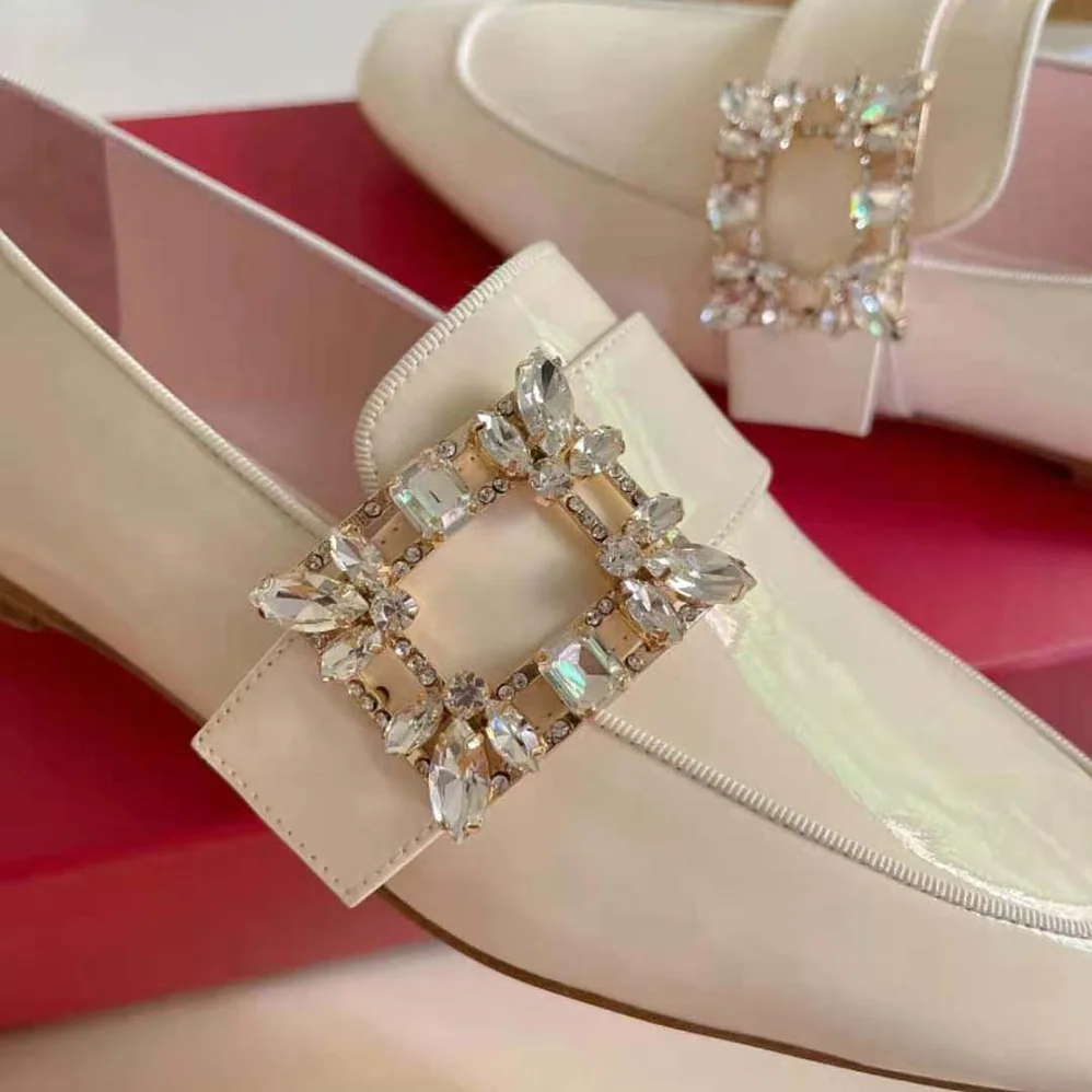 Roger Vivier Mini Broche Vivier Buckle Loafers in Patent Leather for Women in White Roger Vivier Mini Broche Vivier Buckle Loafers in Patent Leather for Women in White