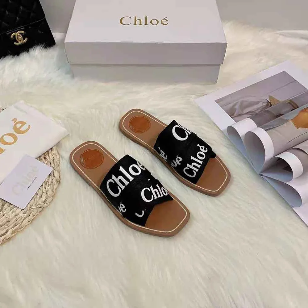 Chloe Woody Flat Mule in Canvas for Women in Black Chloe Woody Flat Mule in Canvas for Women in Black