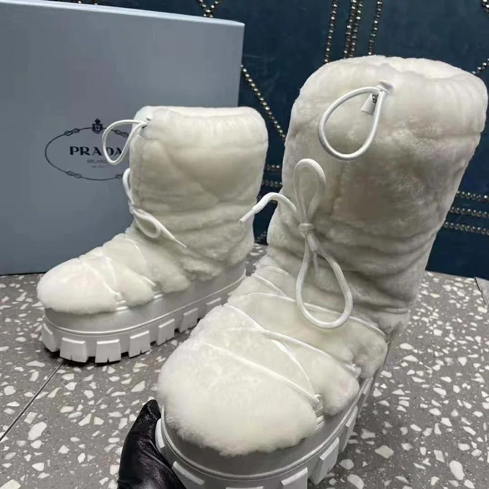 Prada Shearling Apres-ski Boots for Women in White