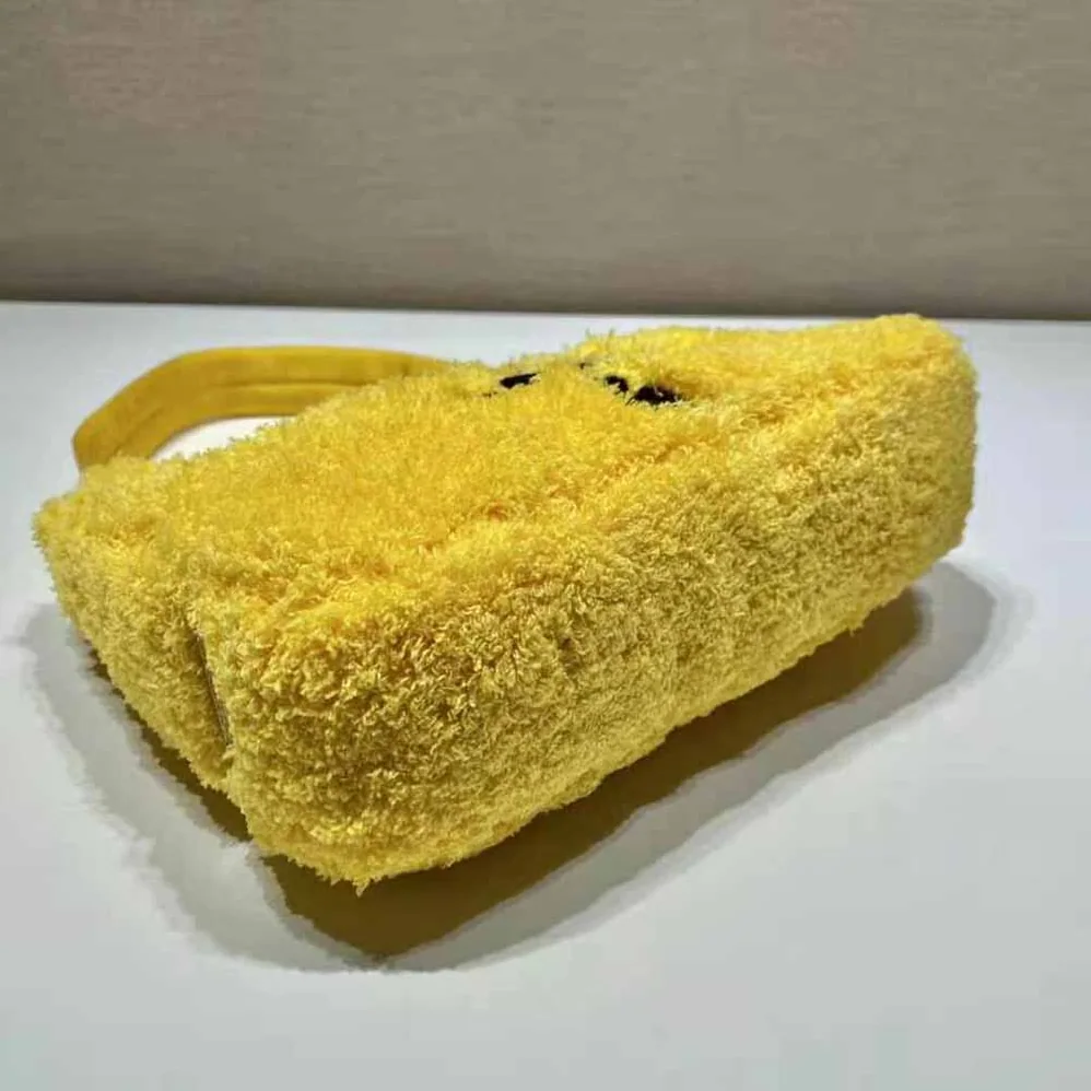 Prada Re-Edition 2000 Terry Mini-Bag for Women in Yellow Prada Re-Edition 2000 Terry Mini-Bag for Women in Yellow