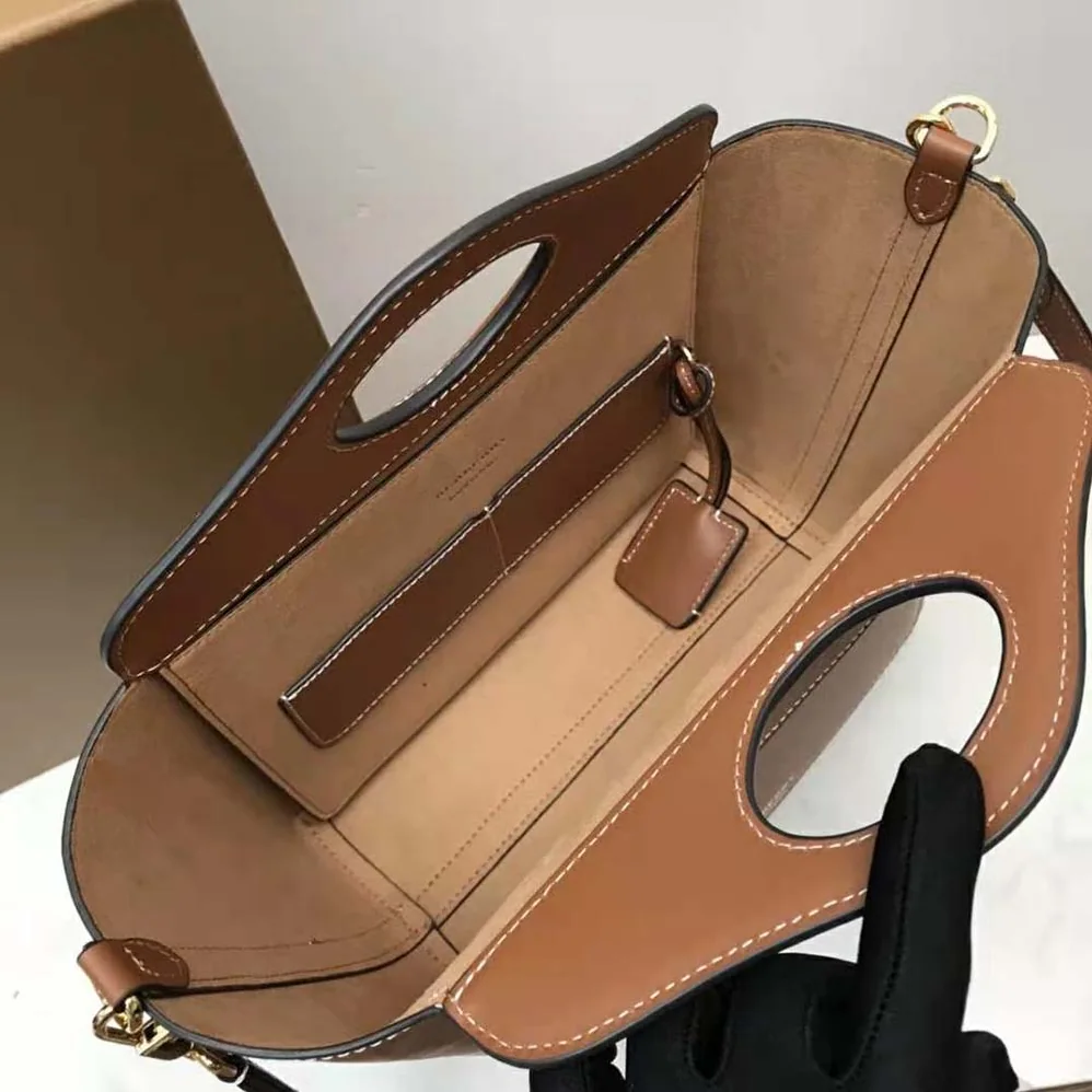 Burberry Mini Leather Soft Pocket Tote for Women in Brown Burberry Mini Leather Soft Pocket Tote for Women in Brown