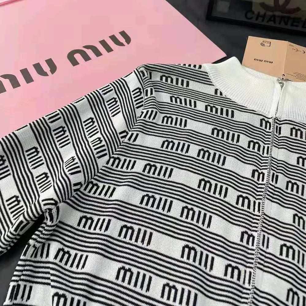 Miu Miu Cashmere and Silk Cardigan with Jacquard Logo for Women in White Miu Miu Cashmere and Silk Cardigan with Jacquard Logo for Women in White