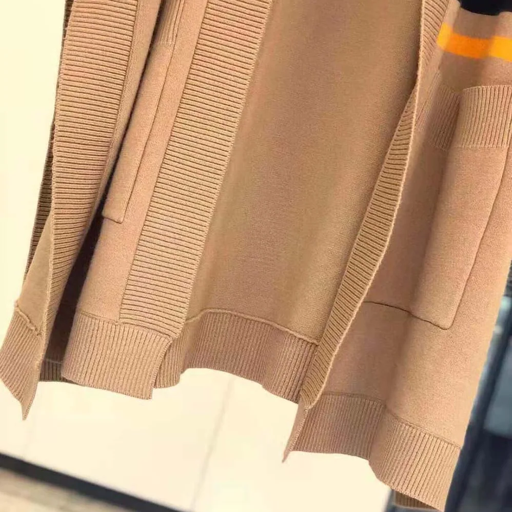 Burberry Monogram Motif Lntarsia Wool Cashmere Blend Cape for Women in Brown Burberry Monogram Motif Lntarsia Wool Cashmere Blend Cape for Women in Brown
