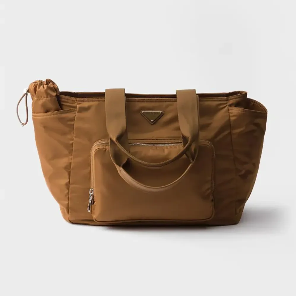 Prada Re-Nylon Baby Bag with Triangle Logo for Unisex in Brown Prada Re-Nylon Baby Bag with Triangle Logo for Unisex in Brown