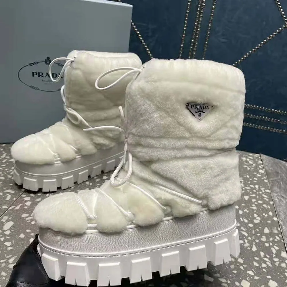 Prada Shearling Apres-ski Boots for Women in White