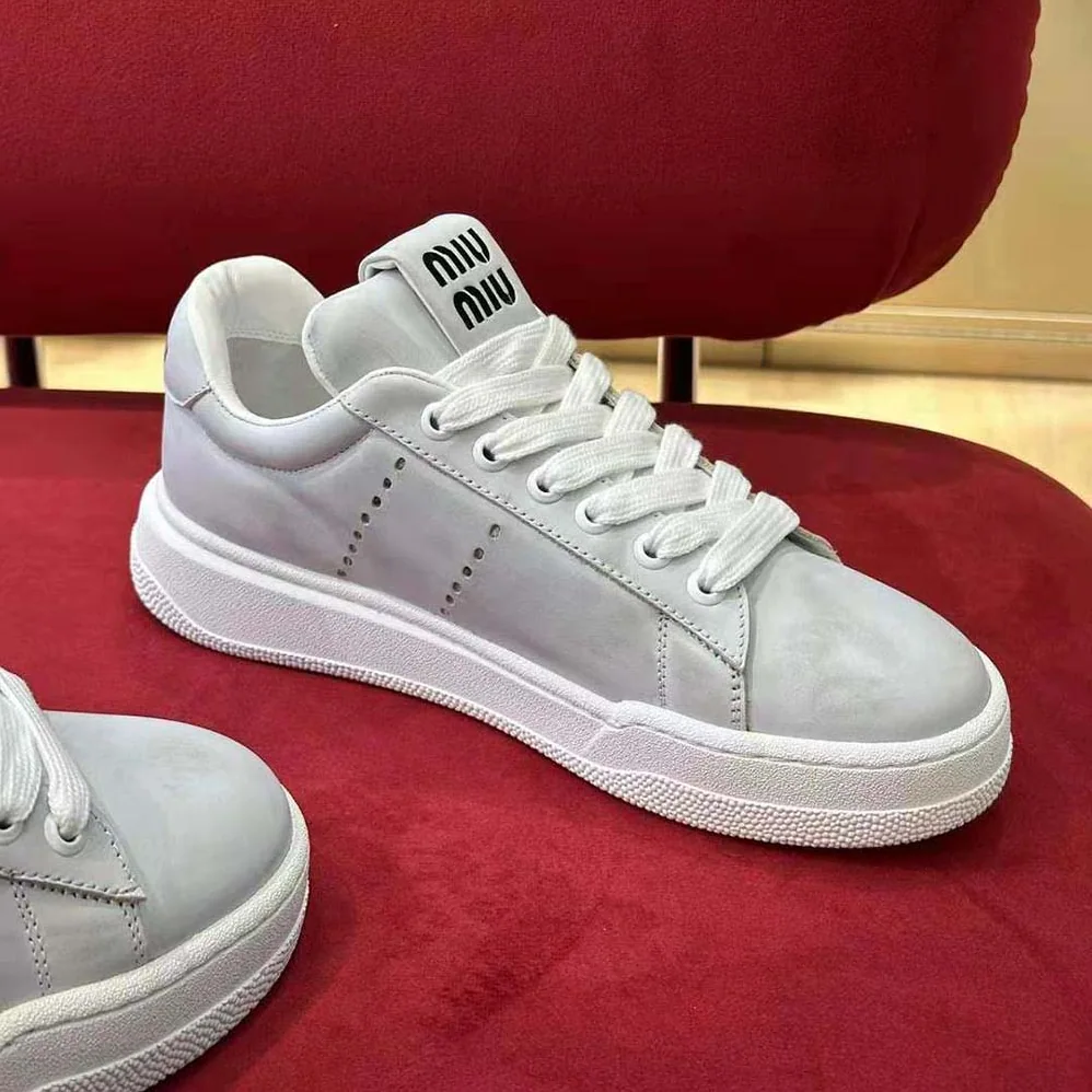 Miu Miu Bleached Leather Sneakers for Women in White
