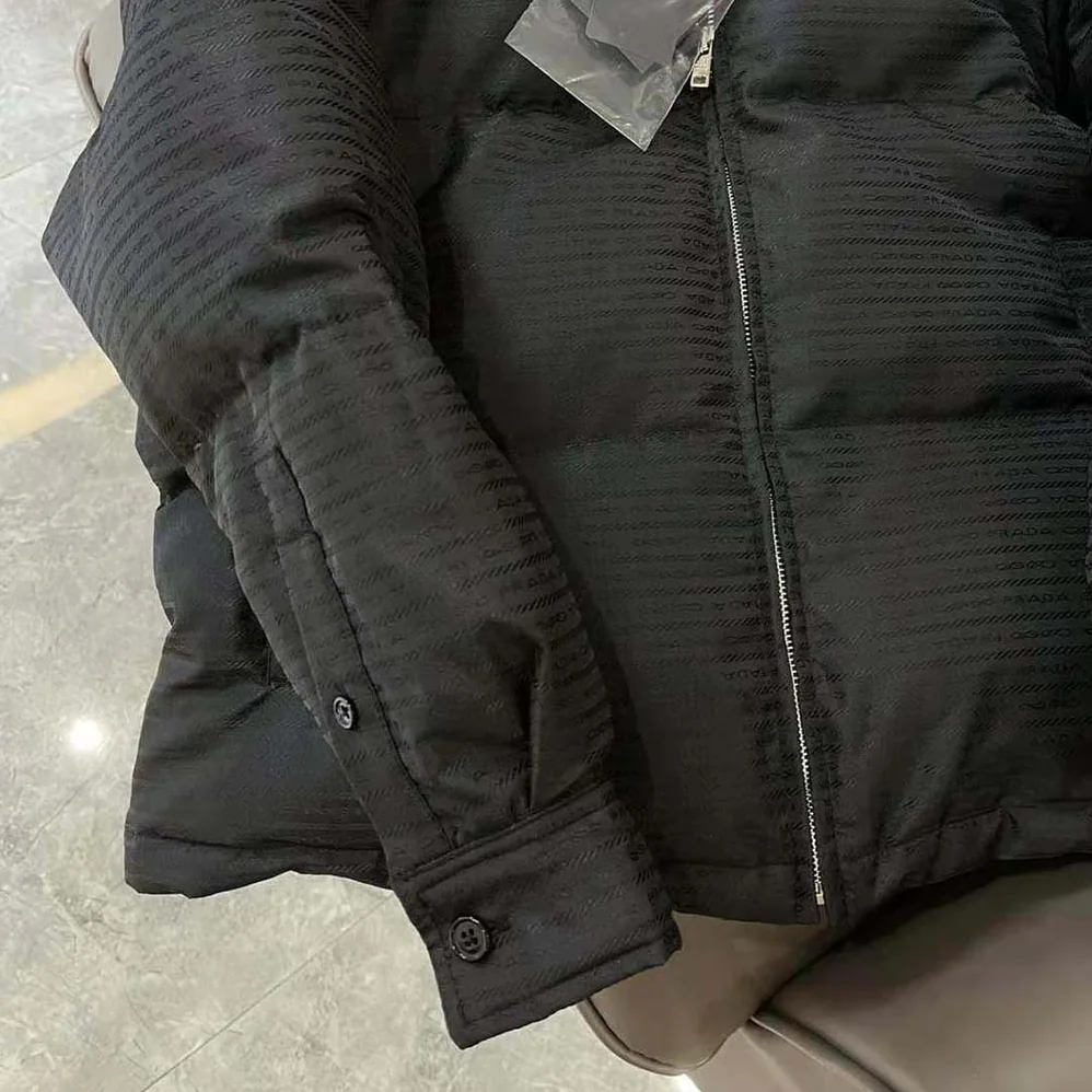 Prada Re-Nylon Hooded Down Jacket for Men in Black Prada Re-Nylon Hooded Down Jacket for Men in Black