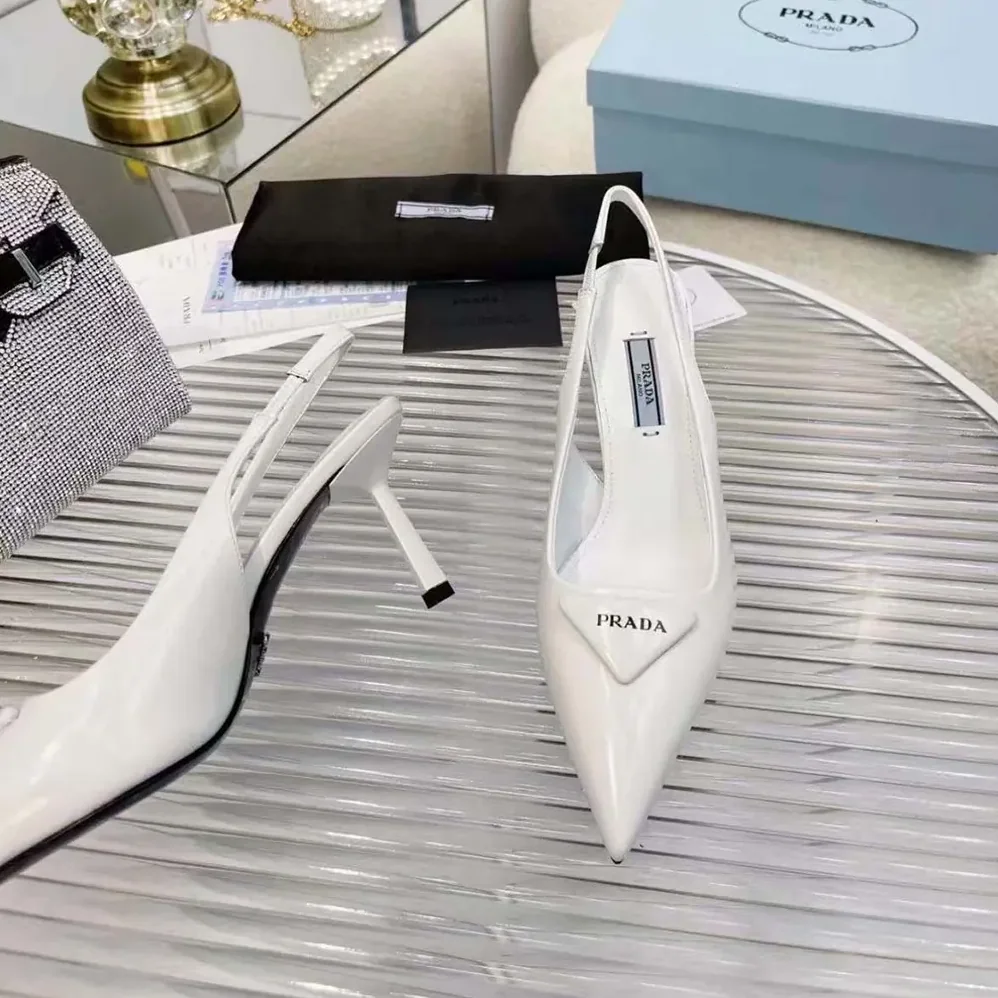 Prada Saffiano Patent Leather Slingback Pumps for Women in White Prada Saffiano Patent Leather Slingback Pumps for Women in White