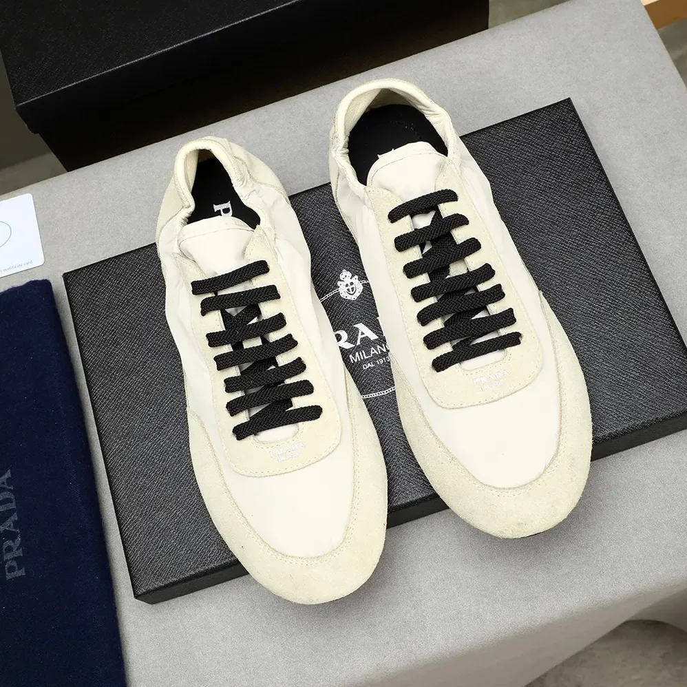 Prada Collapse Re-Nylon and Suede Elasticized Sneakers for Unisex in Ivory Prada Collapse Re-Nylon and Suede Elasticized Sneakers for Unisex in Ivory