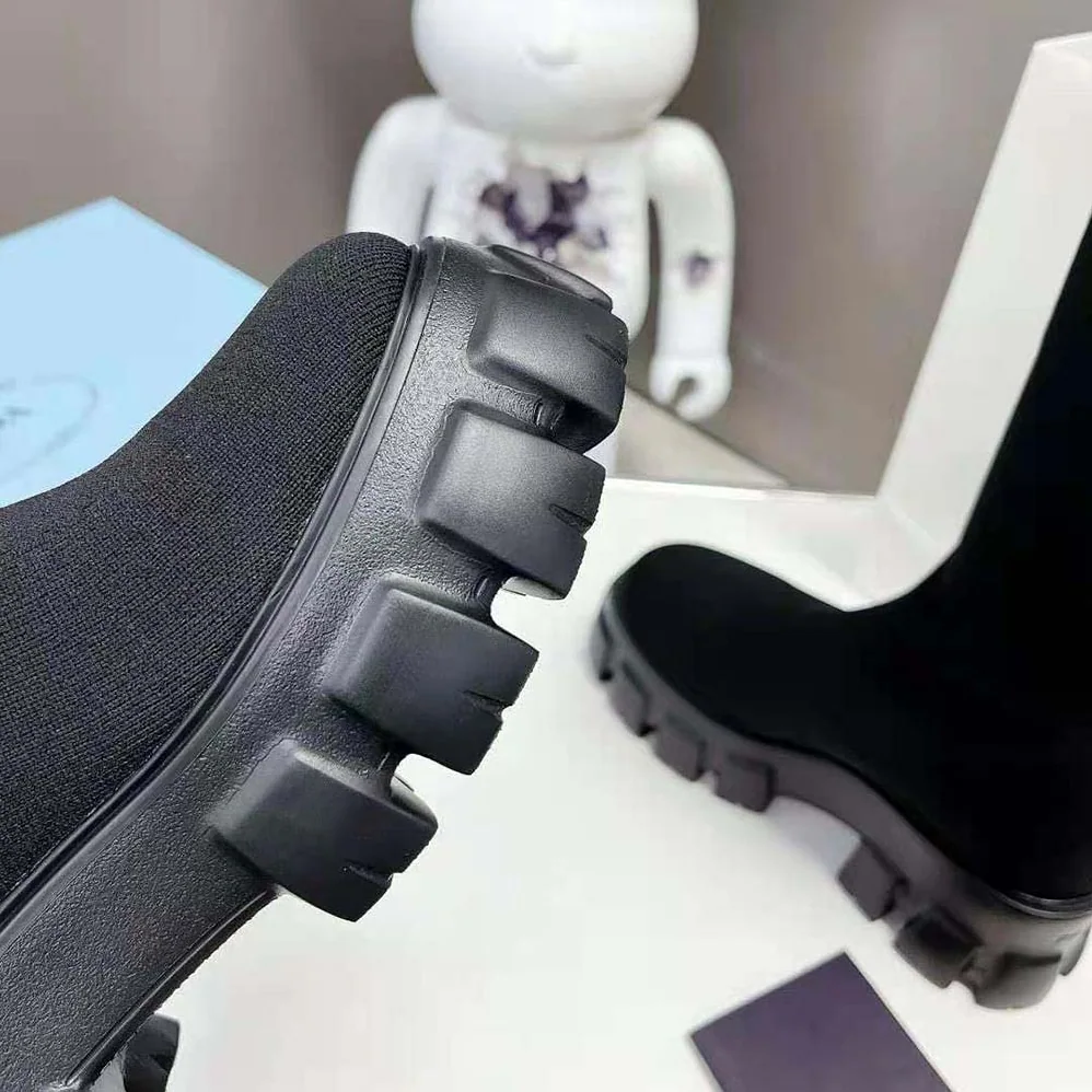 Prada Monolith Knit Boots with Embossed Rubber Triangle Logo for Women Prada Monolith Knit Boots with Embossed Rubber Triangle Logo for Women
